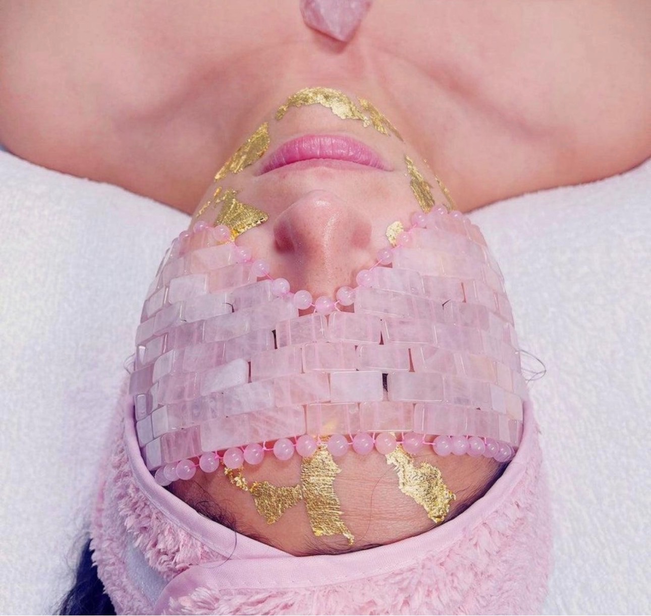 Rose quartz crystal facial